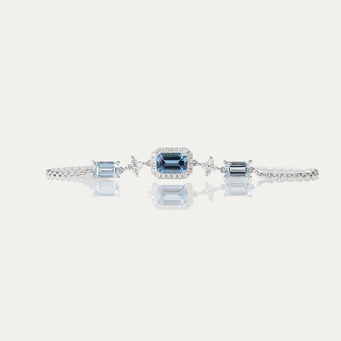 Emerald-cut Santa Maria Aquamarine Halo Diamond Bracelet