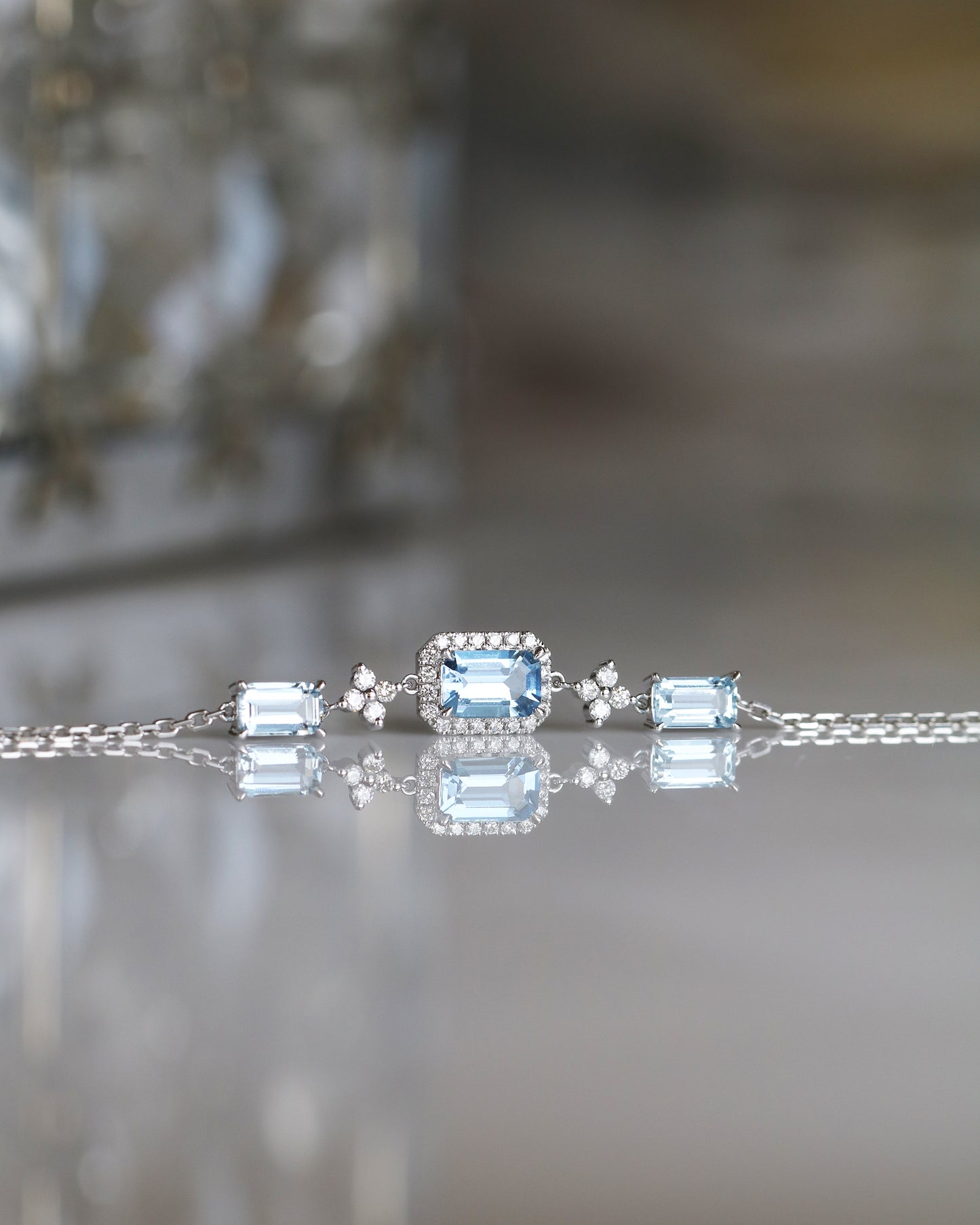 Emerald-cut Santa Maria Aquamarine Halo Diamond Bracelet-Bracelets,Patrea Jewelry,birthstone jewelry Hong Kong, Aquamarine jewelry hk, Bespoke gemstone jewelry HK, Luxury aquamarine 18k gold, 海藍寶首飾 推薦, 天然海藍寶石, 藍寶石 珠寶 香港, Jewelry HK Online, 海藍 寶 價格