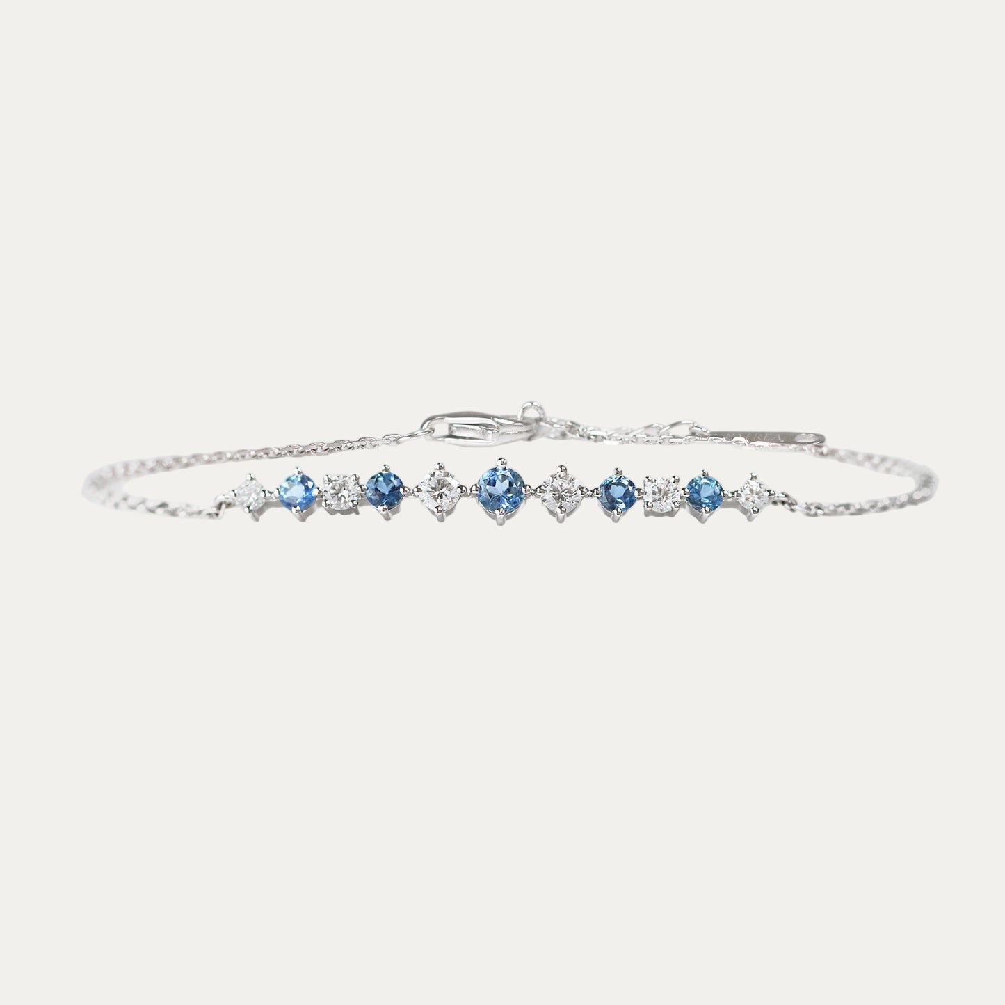 18k White Gold Santa Maria Aquamarine Bracelet on a light gray background