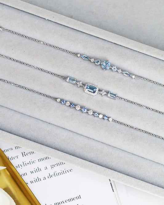 Emerald-cut Santa Maria Aquamarine Halo Diamond Bracelet