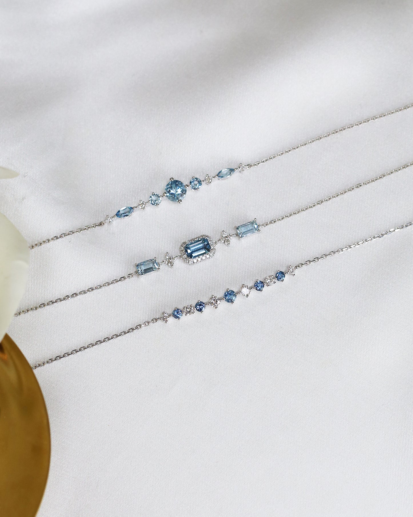 Emerald-cut Santa Maria Aquamarine Halo Diamond Bracelet