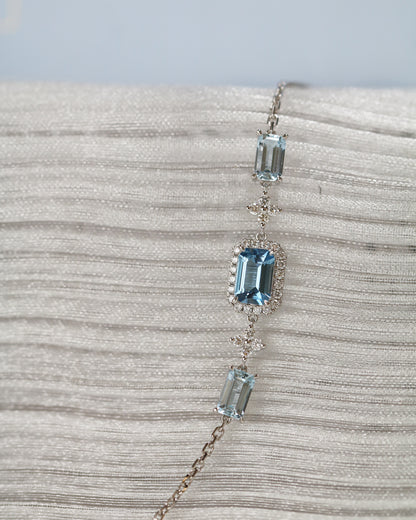 Emerald-cut Santa Maria Aquamarine Halo Diamond Bracelet