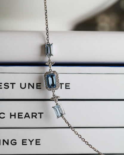 Emerald-cut Santa Maria Aquamarine Halo Diamond Bracelet