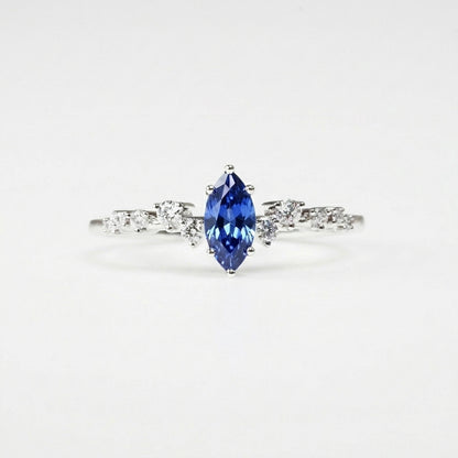 18k White Gold Marquise Sapphire Scattered Diamond Ring