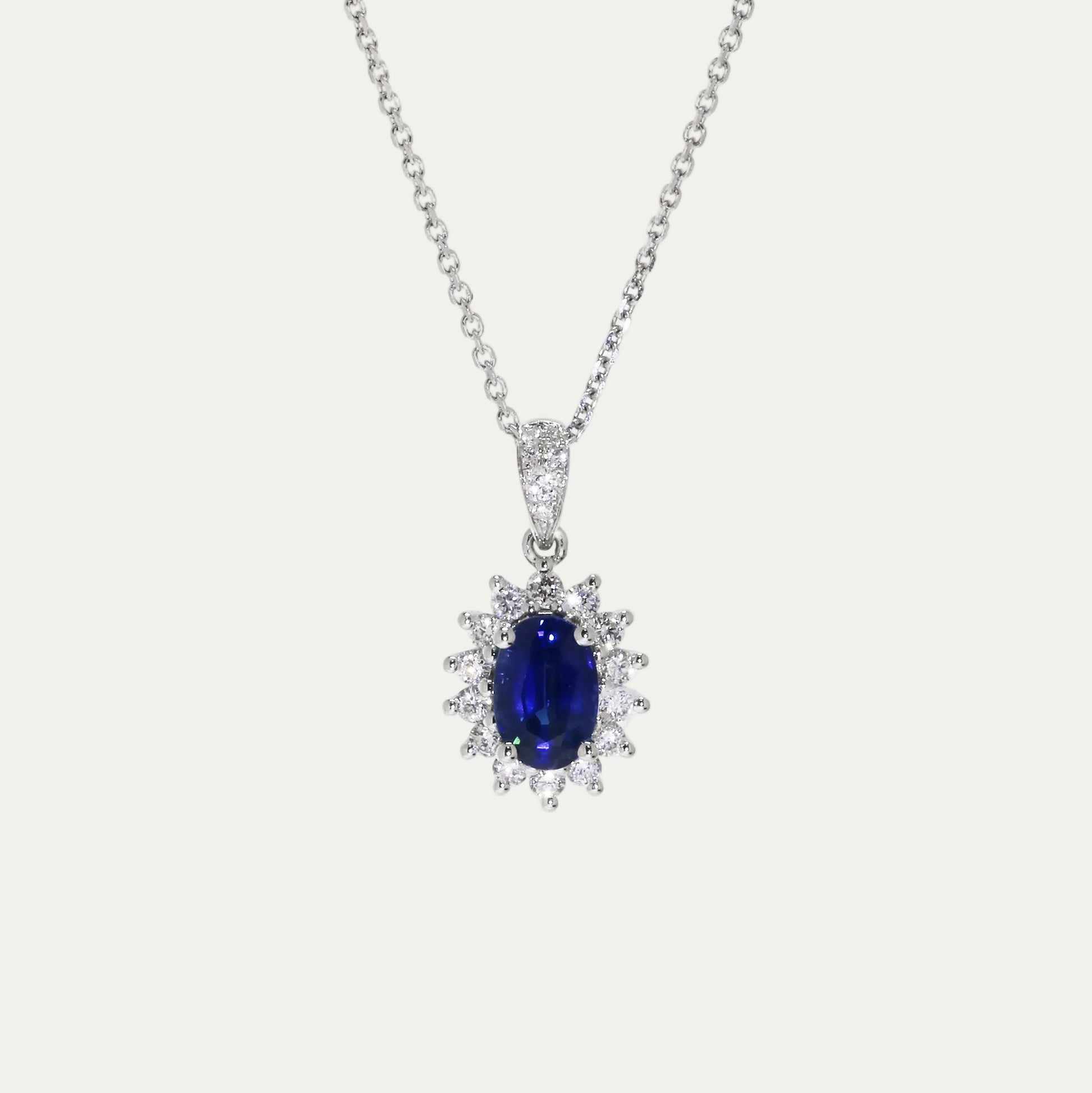 Halo Dimaond Sapphire Pendant on a white background