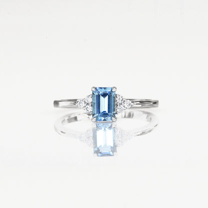 Diamond Ring with a santa maria aquamarine diamond ring on a white background